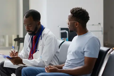 photo of doctor patient consultation